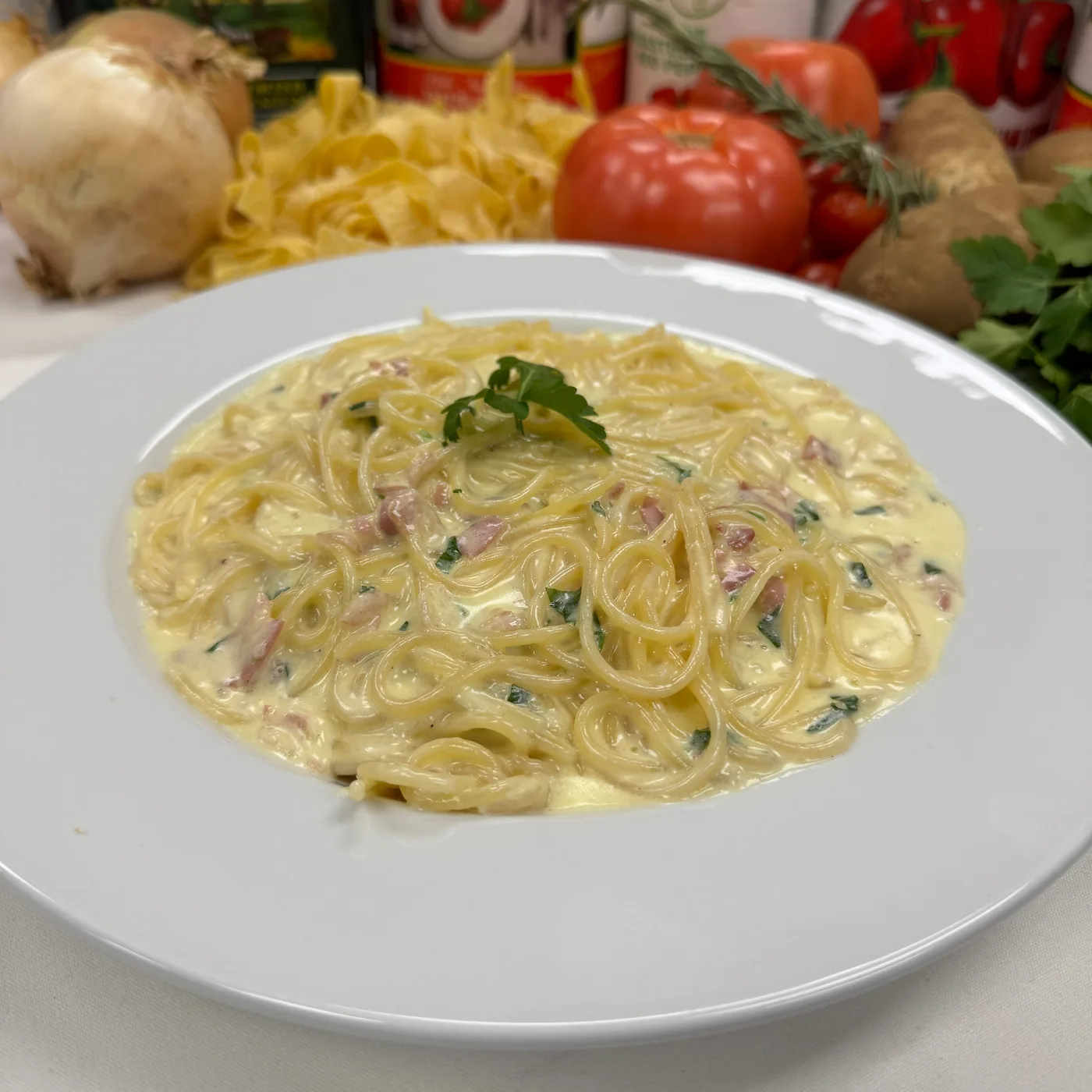 Spaghetti carbonara with pancetta in a cream sauce, finished with parsley