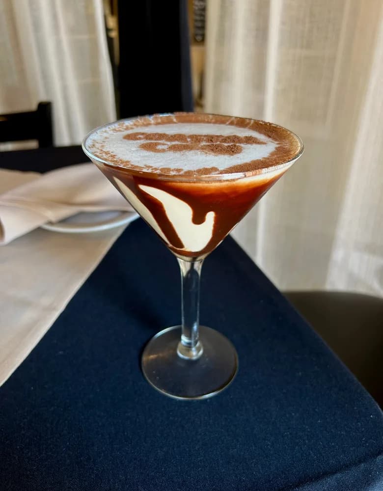 Chocolate martini with a chocolate-striped glass