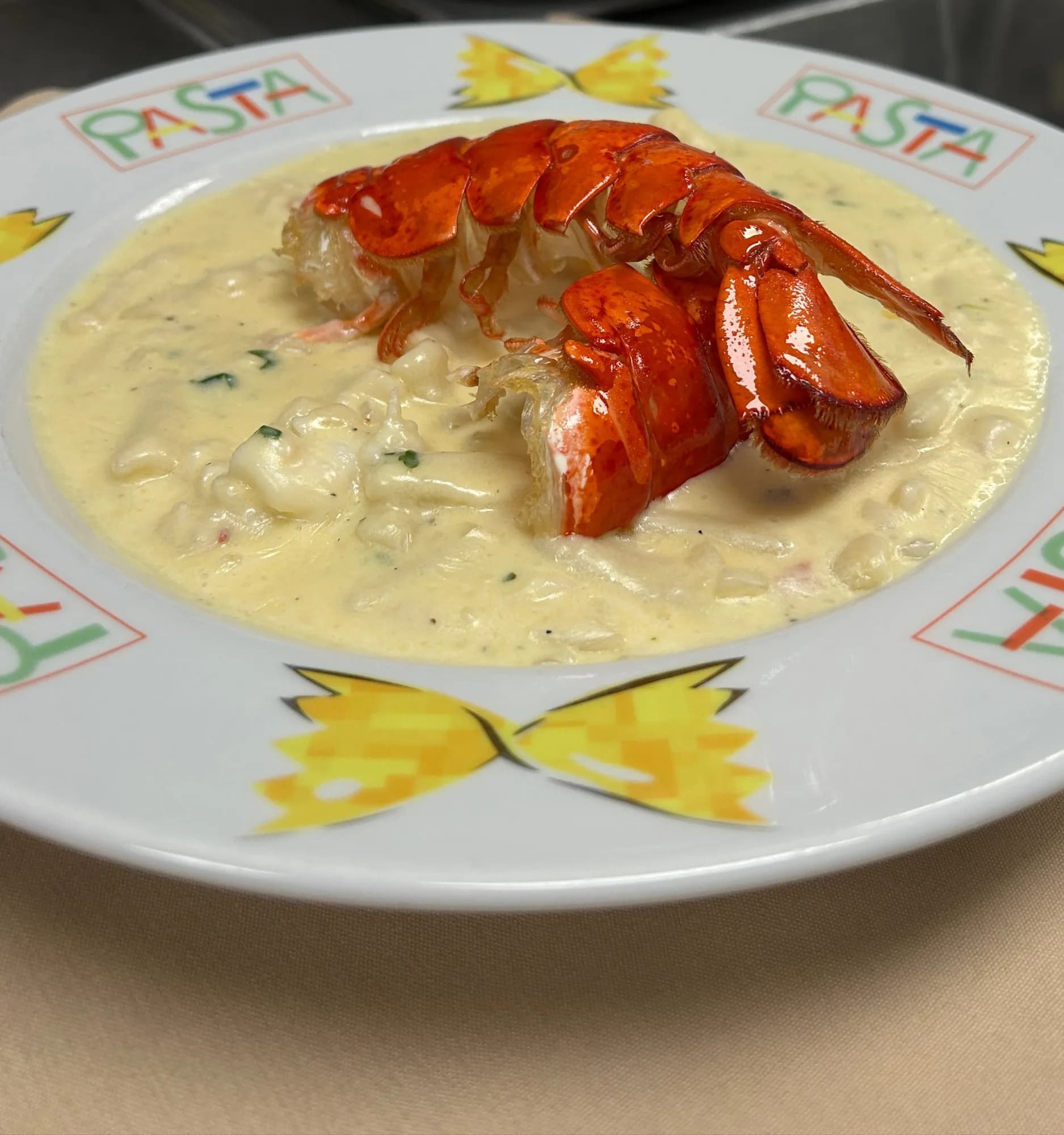 Coastal Capri's lobster mac and cheese: a whole 6 oz lobster tail over cavatelli in a light cream sauce